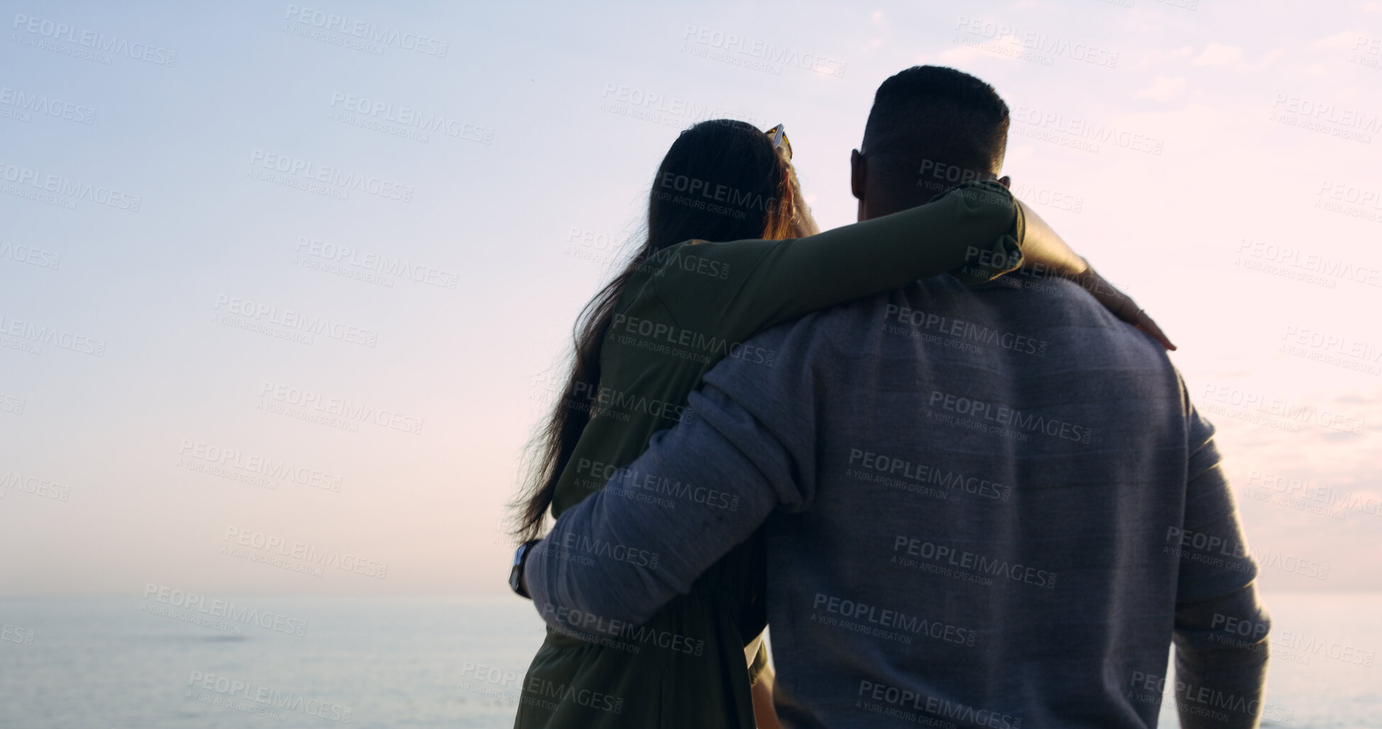 Buy stock photo Sunset, beach and couple with hug on romantic date, holiday adventure or sightseeing from back. Evening sky, man and woman on travel vacation with love, view or outdoor journey together at ocean