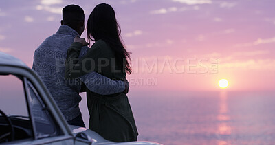 Buy stock photo Sunset sky, ocean and couple embrace on road trip, romantic date or holiday adventure together. Evening view, man and woman at car on travel vacation with love, beach and outdoor journey from back