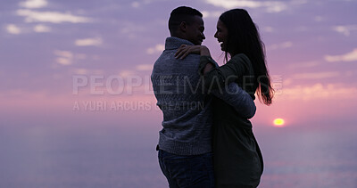 Buy stock photo Sunset, beach and couple embrace on romantic date, holiday adventure or happy in nature. Evening cloudy sky, man and woman on travel vacation with love, dance and outdoor journey together at ocean