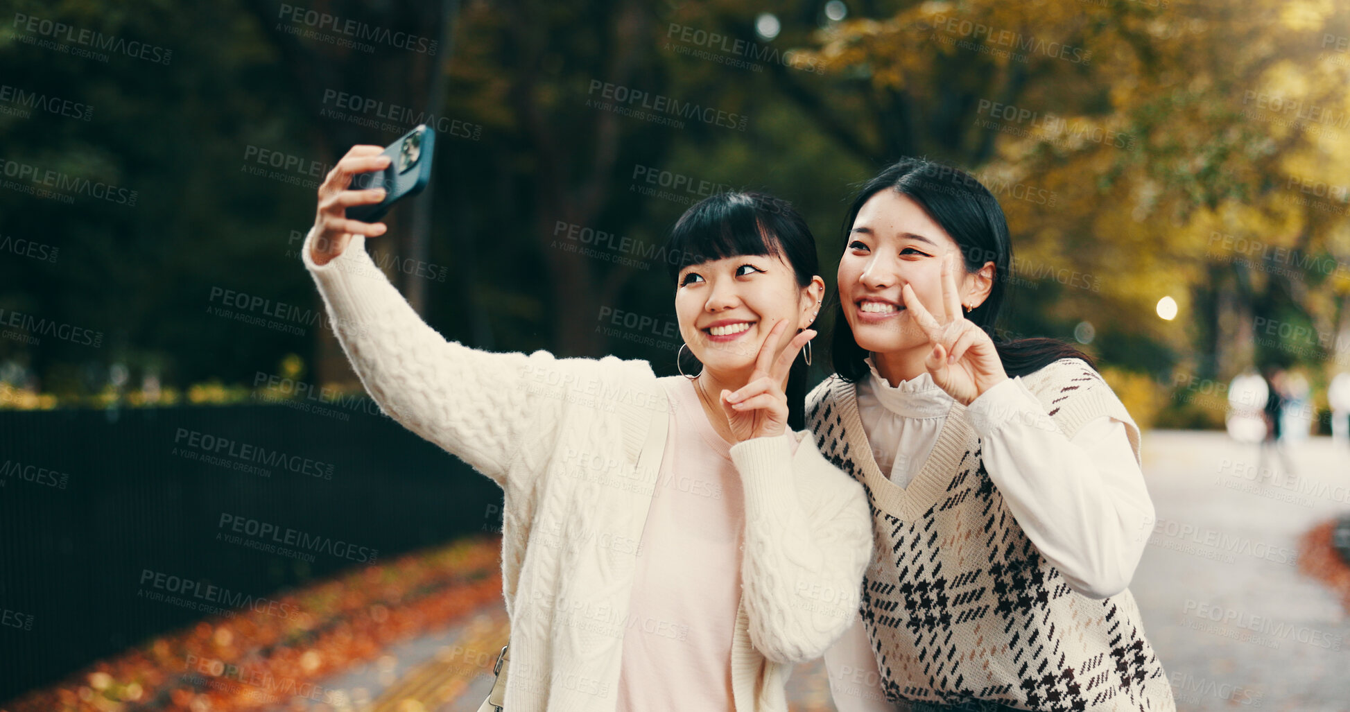 Buy stock photo Peace sign, friends and Asian women with selfie in park for fun, bonding and relax on weekend. Travel, happy and people with photo for profile picture, social media post and memory in Japan