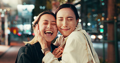 Buy stock photo Happy, asian women and night with hug for love, care or bonding together in an urban town or city. Japan, female people or friends with smile in late evening for travel or fun moment in Tokyo street