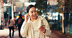 Happy, asian woman or night with earphones for music, listening or radio podcast in city. Japan, female person or tourist with smile on mobile smartphone for sound or audio streaming in an urban town