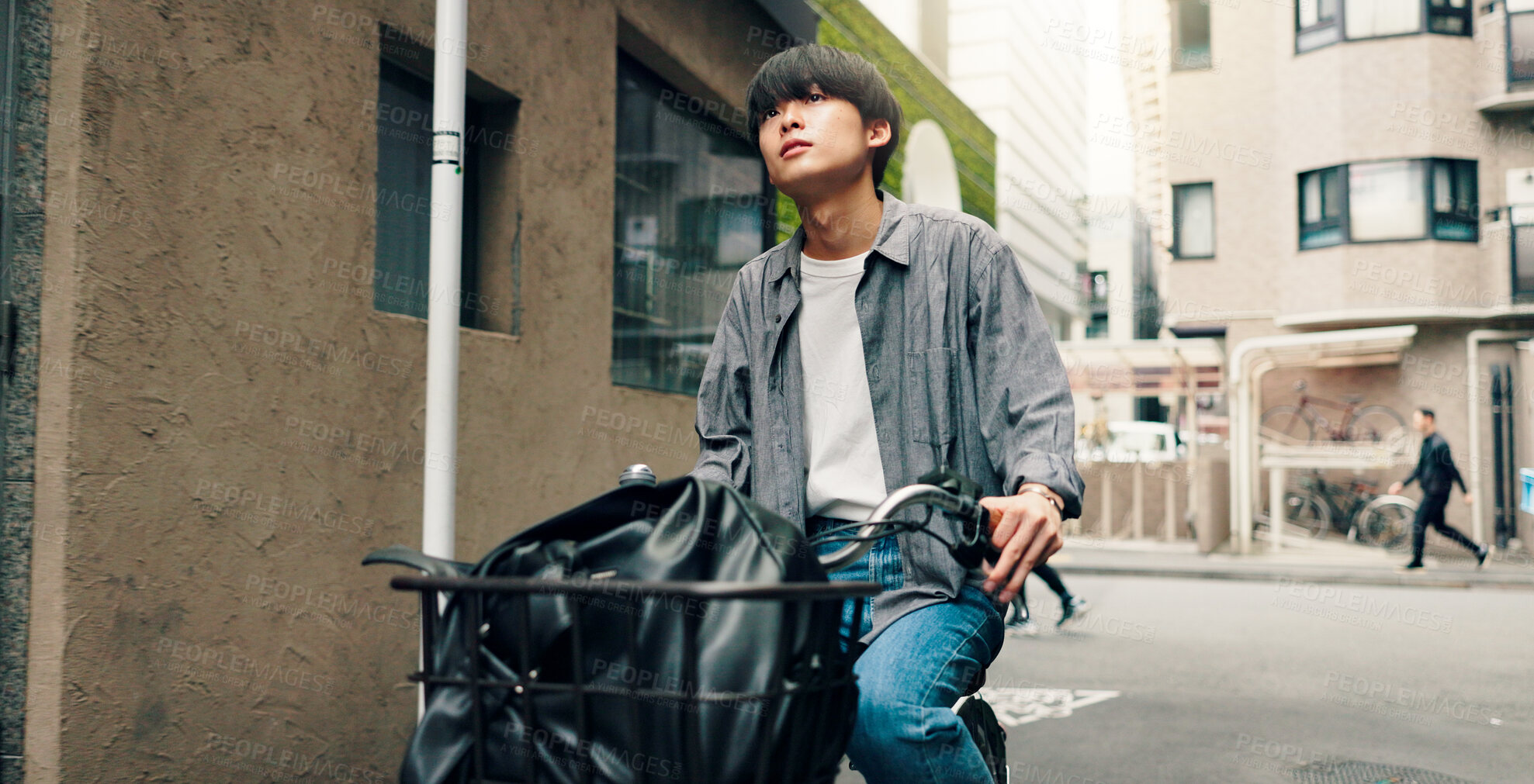 Buy stock photo Travel, thinking and Asian man with bicycle in city for morning commute, adventure and journey outdoors. Location, cycling and person on bike for trip, sustainable and eco friendly transport in Japan