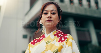 Buy stock photo Portrait, kimono and low angle with Japanese woman in city for heritage, festival ceremony and culture. Traditional clothes, fashion and respect with person and Japan outdoor for pride and peace