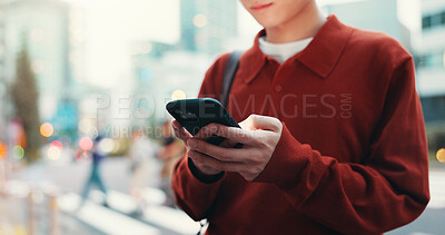 Buy stock photo City, hands and person in street with phone, morning commute or typing on mobile app for online chat. Urban, travel and Japanese student on sidewalk with smartphone, social media post or connectivity