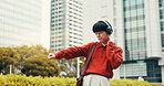 Man, headphones and worker travel or dancing in city, streaming playlist and online for listening. Male person, outdoor employee and hearing sound on journey in Japan, urban town and song movement