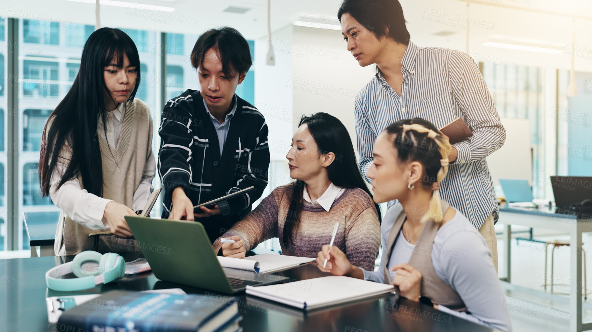 Buy stock photo Japanese people, discussion and laptop for business meeting, collaboration and writing notes in office. Group, together and technology for brainstorming, teamwork and project management as colleagues