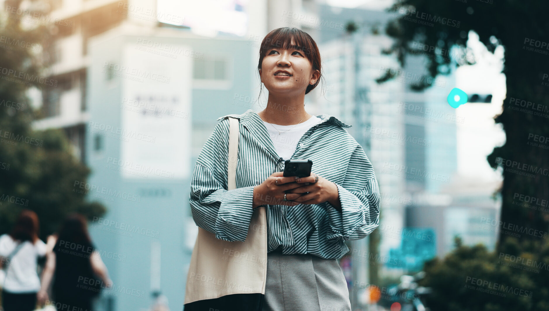 Buy stock photo Woman, thinking and phone for travel in city, walking and online map for navigation in town. Female person, location and explore internet for direction in Japan, contemplating route and plan commute