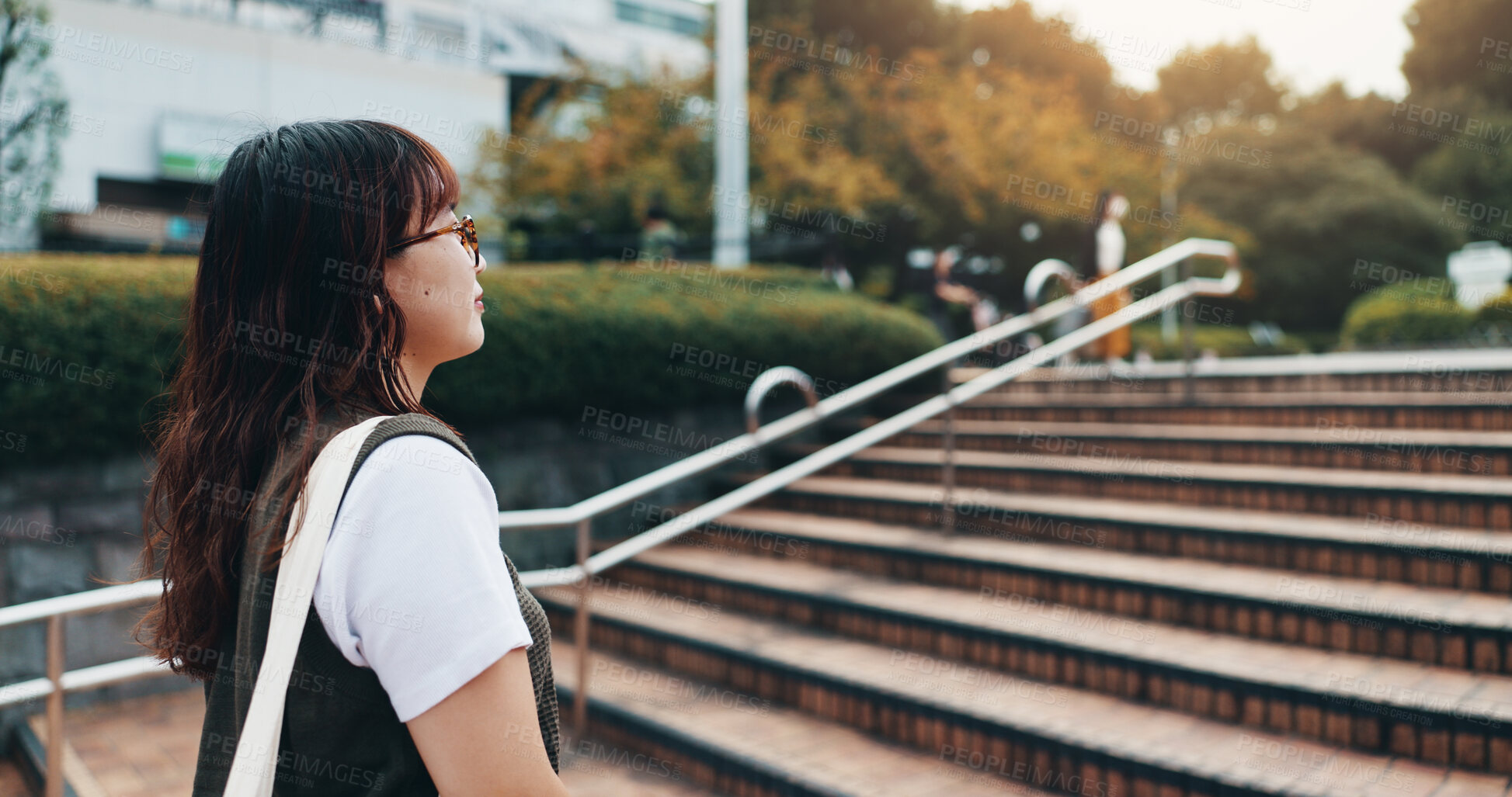 Buy stock photo Walking, stairs and woman in city for travel with international exchange student program. Steps, education and young female person on commuting journey in town for university or college in Japan.