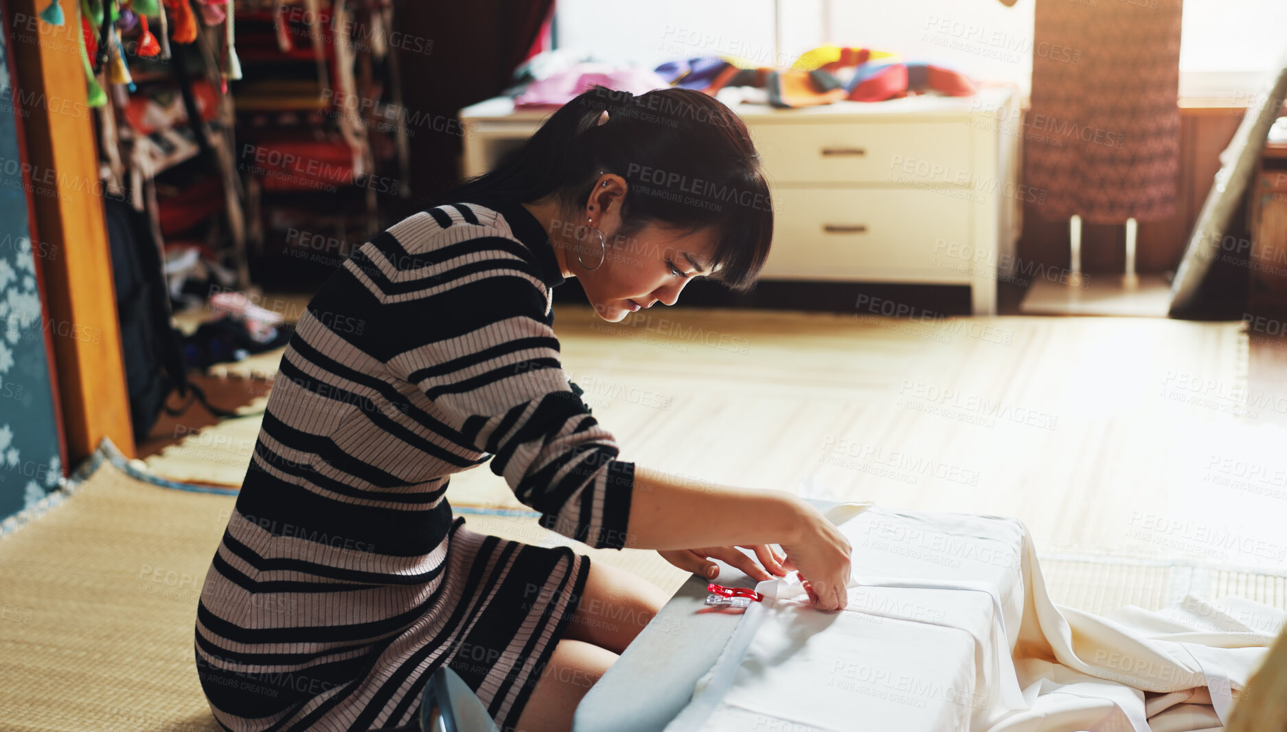 Buy stock photo Fashion designer, seamstress and Asian woman in workshop for stitching, manufacturing and process. Small business, boutique and person with material, fabric and textile for tailor service in Japan