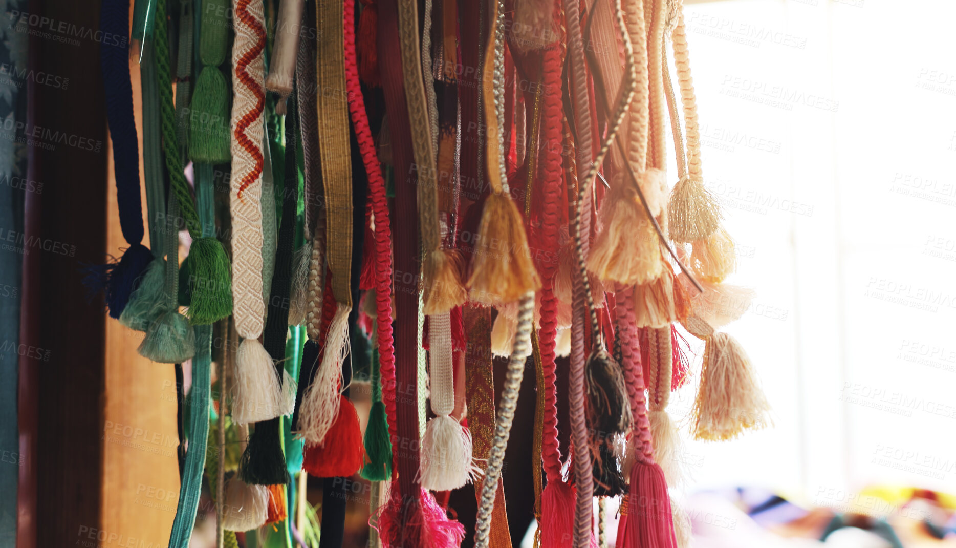 Buy stock photo Shrine, worship and sacred rope for Japanese tradition, history and spiritual practice at holy site, Straw, shinto and outdoor with ritual product or string souvenir with travel, culture and Japan