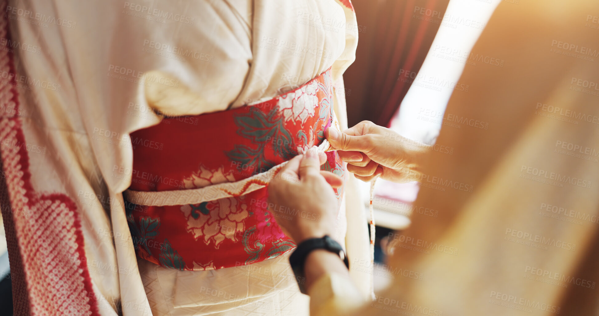 Buy stock photo Kimono, fabric and help with hands of people at tailor in japan for designer, boutique and fashion. Festive ceremony, culture and traditional clothes with closeup of obi belt and customer for shop