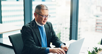 Buy stock photo Business, confused and man with laptop, serious and typing with email, network and accounting. Japanese person, economy analyst and mature employee with pc, doubt or questions with glitch or computer