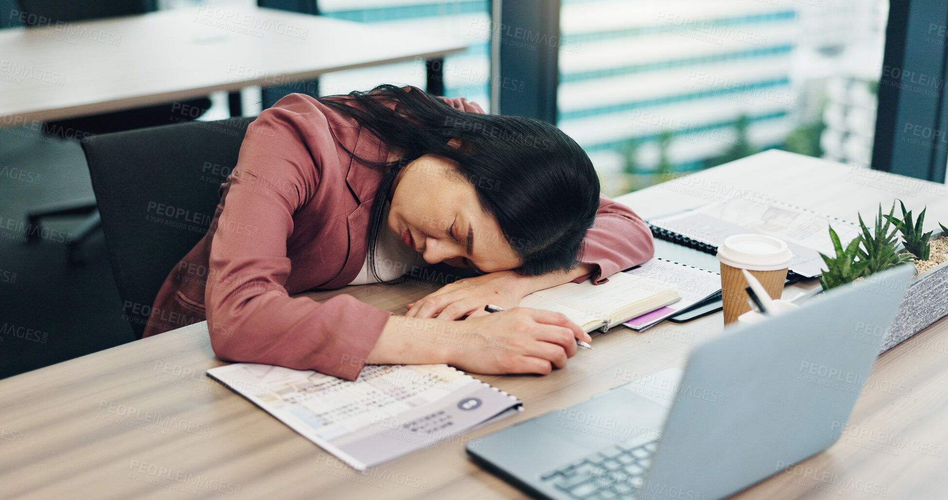 Buy stock photo Asian woman, sleeping or desk with documents or laptop for overworked, fatigue or burnout at office. Japan, female person or tired employee asleep with rest for break, crisis or lazy day at workplace