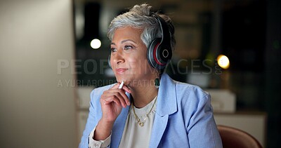 Buy stock photo Business woman, thinking and headphones for video call, virtual meeting or remote work online at night. Mature teacher, computer or webinar for learning, ideas or education in home office on overtime