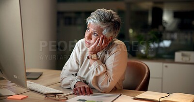 Buy stock photo Frustrated, mature woman and night with computer for deadline, pressure or difficult task at office. Female person, employee or designer working late with error, mistake or issue for evening report