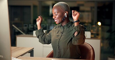 Buy stock photo Happy, black woman and dance with earphones in office, listening to music and podcast for movement rhythm. Person, secretary and computer with energy, overtime and entertainment for project deadline