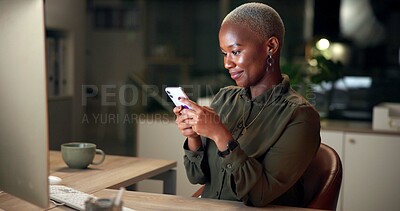 Buy stock photo Night, business woman and smile with cellphone, typing and brainstorming with overtime planning. Black person, employee and accountant with smartphone, communication and professional project proposal