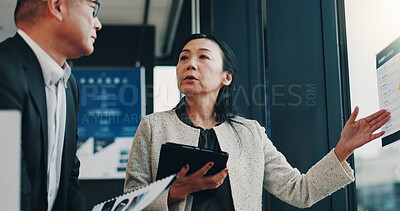 Buy stock photo Asian, business people and presentation with tablet for company policy, schedule or planning at office. Japan, businessman and woman with documents or technology for corporate proposal at workplace