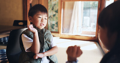 Buy stock photo Japanese, children and play clapping game for motor skills, traditional activity and bonding together. Boy, girl and hands for culture fun, eye coordination and language development at house in Japan