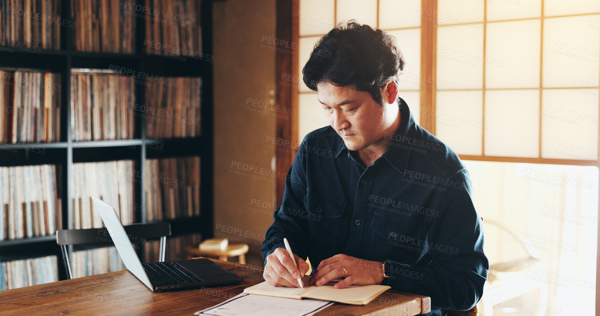 Buy stock photo Writing, laptop and remote work with Japanese man in home office for schedule, planning and idea. Notebook, journal and admin with person and research for freelancer, entrepreneur and brainstorming