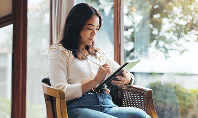 Buy stock photo Woman, pen and tablet in home for research, digital drawing and connectivity in Japan. Asian person, tech and relax in living room with social media, news scroll and journal blog in creativity app