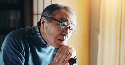 Buy stock photo Thinking, senior and japanese man with walking stick and sad memory with struggle to remember. Alzheimer, loss and grief from dementia news with solitude of lonely elderly person with disability