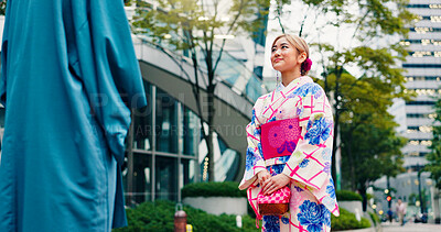 Buy stock photo Asian woman, kimono and city with fashion for tradition, culture or meeting in Tokyo. Japan, female person and tourist with stylish clothing, dress or outfit in an urban town for heritage or travel