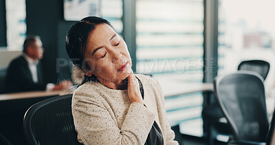 Buy stock photo Woman, stress and neck pain in office for business, overworked and fatigue in Japanese company. Mature accountant, burnout and injury in workplace with muscle tension, sprain and massage for relief