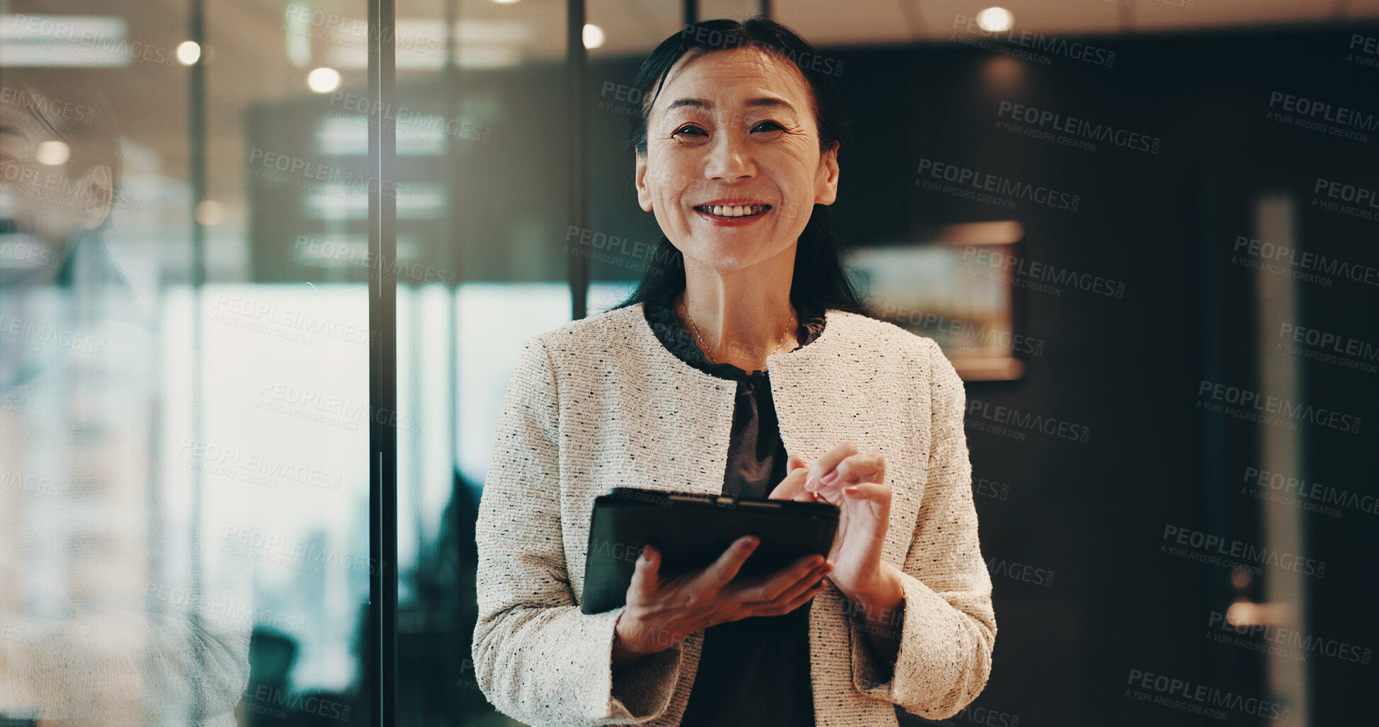 Buy stock photo Mature woman, tablet and portrait for business, communication or research in office with night. Manager, technology and Japan for networking acquisition, performance review or proposal with kpi tools