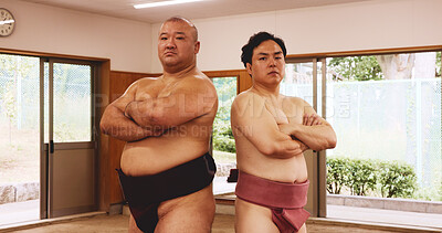 Buy stock photo Sumo wrestler, arms crossed and portrait of Japanese people in dojo ring for pride, training or martial arts fight. Tournament, challenge and battle with men for festival, competition and culture