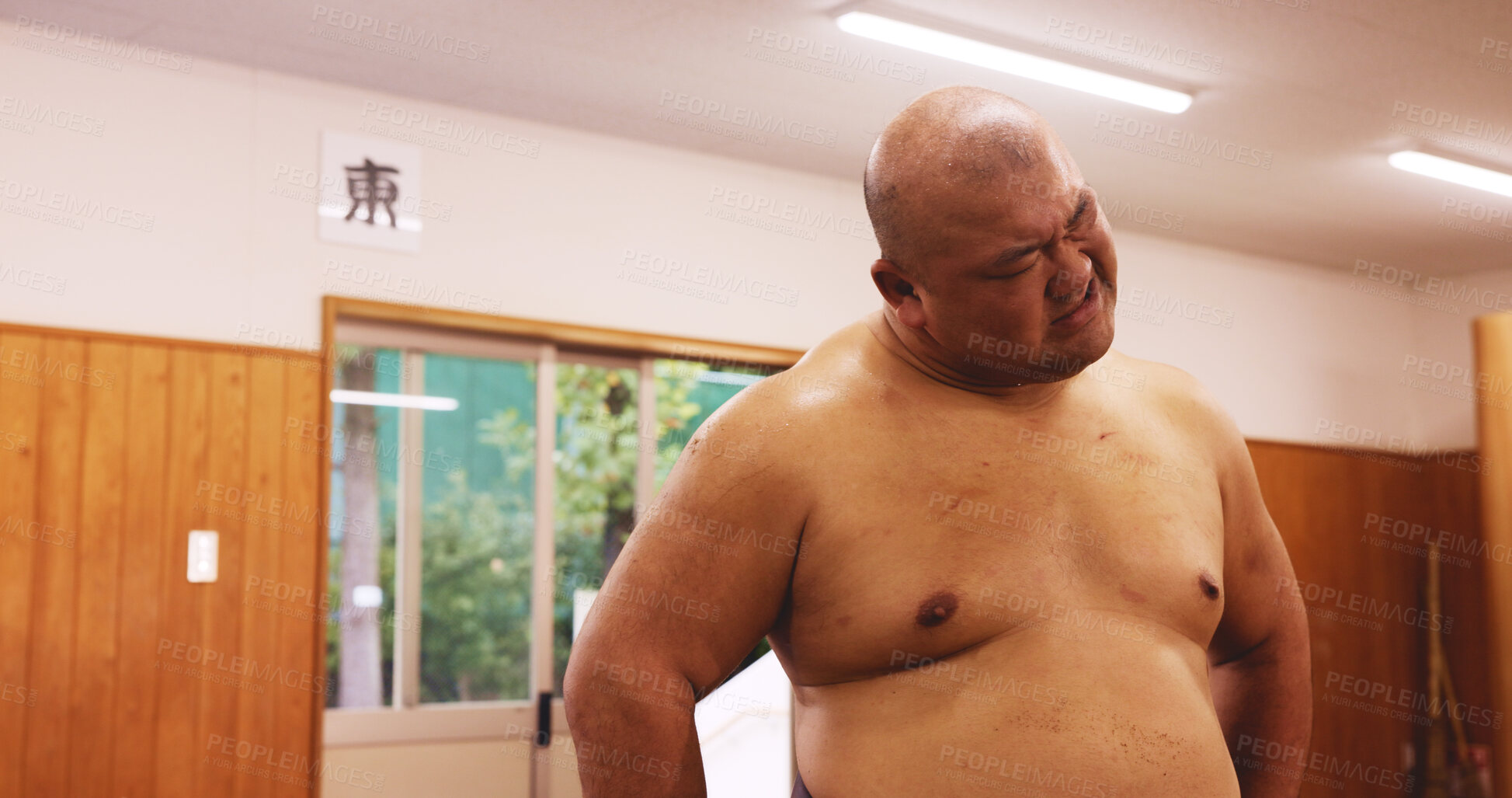 Buy stock photo Athlete, man and training for sumo, workout and fatigue with exhausted, breathing and break in Japan. Exercise, tired and sports in dohyo for practice, fitness and wrestling with bruise or recovery