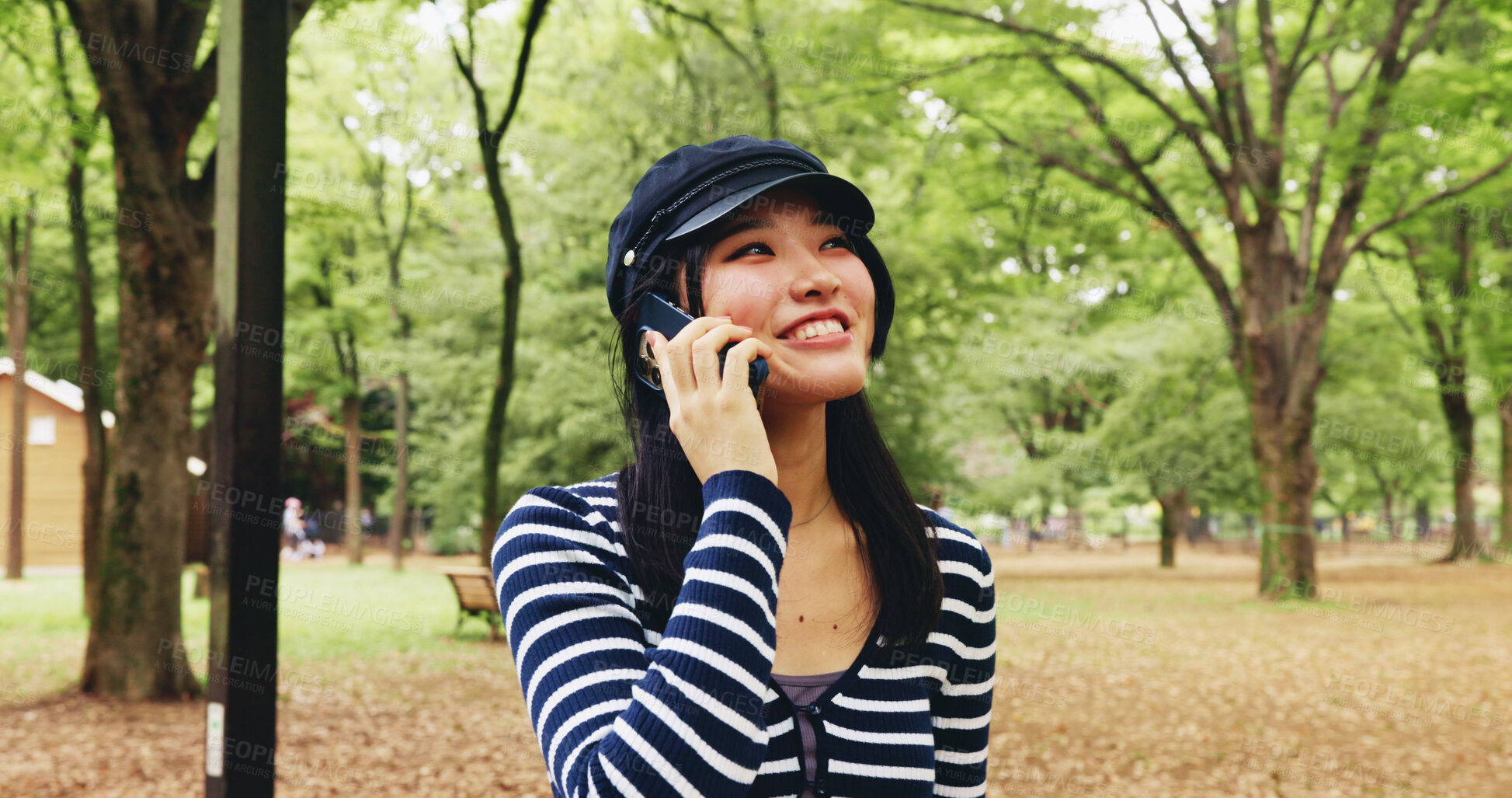 Buy stock photo Happy, asian woman or park with phone call for travel, sightseeing or communication in nature. Japan, female person or tourist with smile on mobile smartphone for commute, destination or conversation