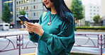 Hands, woman and typing with phone in city for communication, social media and chat notification. Girl, commute and mobile with navigation app for location, reading blog and website texting in Japan