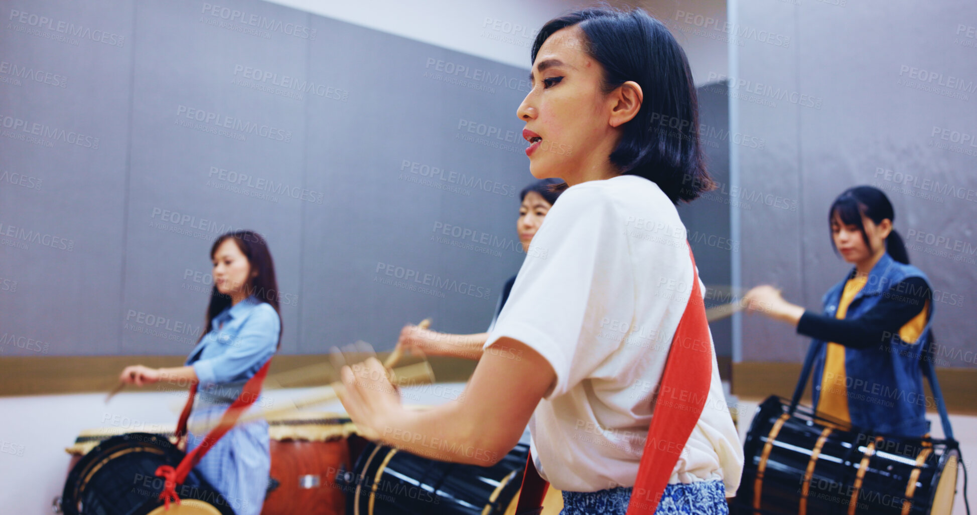 Buy stock photo Japanese tradition, drums and people with music or instrument for performance, creativity or class. Taiko, women or female drummers learning in band to play in rehearsal for culture, rhythm or beat