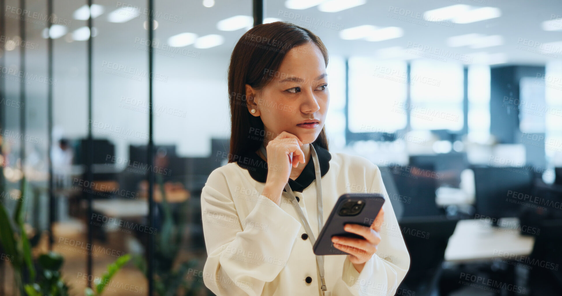 Buy stock photo Woman, thinking and phone in office for business, planning and email feedback in company. Japanese accountant, idea and mobile in agency for investment research, communication and schedule management