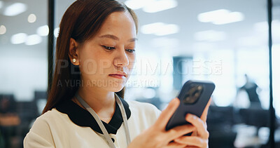 Buy stock photo Phone, typing and businesswoman in office with email, networking or communication for investment. Technology, contact and Japanese female financial planner with cellphone for online finance report.