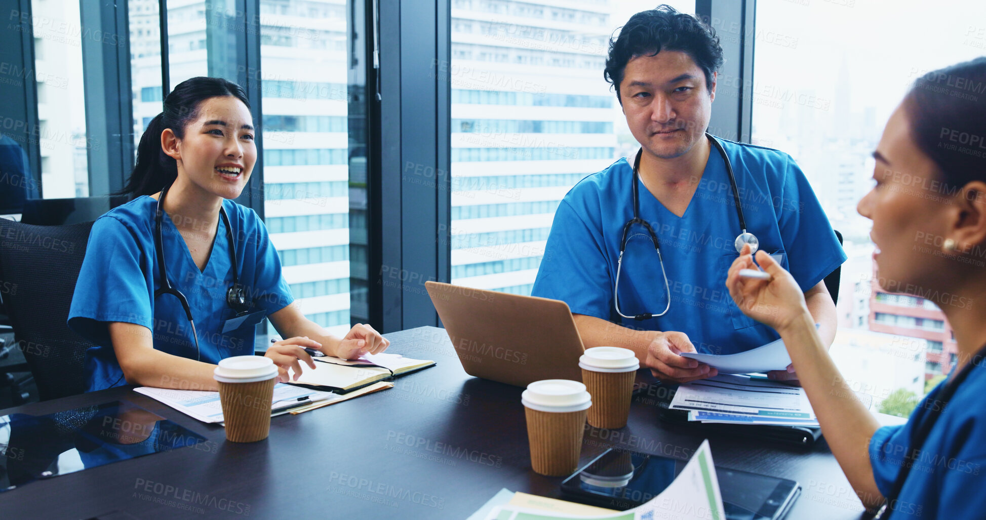 Buy stock photo Asian people, nurse or team with laptop in meeting for medical discussion, planning or budget at hospital. Japan, group or healthcare employees with paperwork or documents for clinic funding or ideas