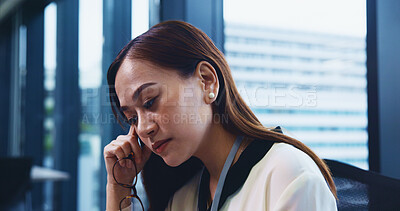 Buy stock photo Japanese woman, tired and stress in office for project, deadline and workload as financial advisor. Female person, fatigue and headache with anxiety or pressure for wellness, mental health and break 
