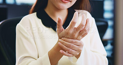 Buy stock photo Injury, business hands and wrist pain in office from muscle ache, inflammation or carpal tunnel syndrome. Japanese firm, professional woman and joint sprain with massage, uncomfortable and discomfort