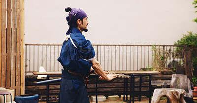 Buy stock photo Dojo, Kenjutsu and sword with Samurai man in Japan for combat, martial arts or training, Culture, fighting and weapon with Japanese person in kendogi for discipline, exercise or practice routine