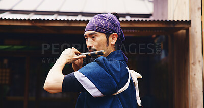 Buy stock photo Japanese man, flute and music for history, artist performance and zen sound for Shinto meditation. Sensei person, bamboo and fue instrument for practice, culture and spiritual heritage with Ryeteki