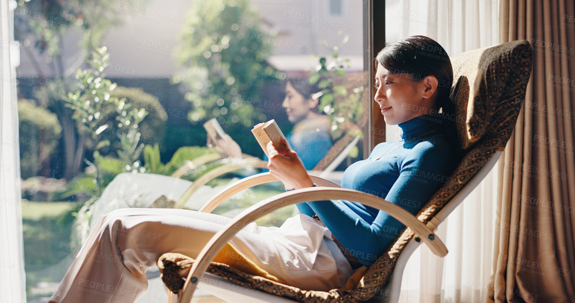 Buy stock photo Reading, rest and Asian woman with book, morning and knowledge with literature, relax or weekend. Home, peace and person with novel, chill and comfortable with story, break and cozy on chair or Japan