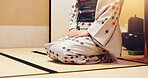 Kimono, sitting and woman in tea room with traditional fashion, Asian culture and respect on bamboo mat. Hospitality, service and girl on tatami floor with Japanese clothes, ceremony and mindfulness