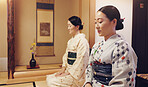 Tea room, guests and women with ceremony, wellness and traditional kimono for culture. Mindfulness, friends and girls with cultural outfit for matcha drink, tatami and respect for home hospitality