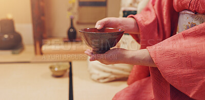 Buy stock photo Hands, guest and drink with bowl, chawan and traditional kimono for tea ceremony. Japanese ritual, spirituality and mindfulness with cultural outfit for herbal matcha, respect and home hospitality