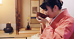 Woman, guest and drink with bowl, chawan and traditional kimono for tea ceremony. Japanese ritual, spirituality and mindfulness with cultural outfit for matcha drink, respect and home hospitality