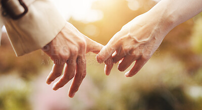 Buy stock photo Love, closeup and holding hands with couple in park for romance, bonding and relationship. Support, care and trust with people in Japan nature date for connection, commitment and peace together