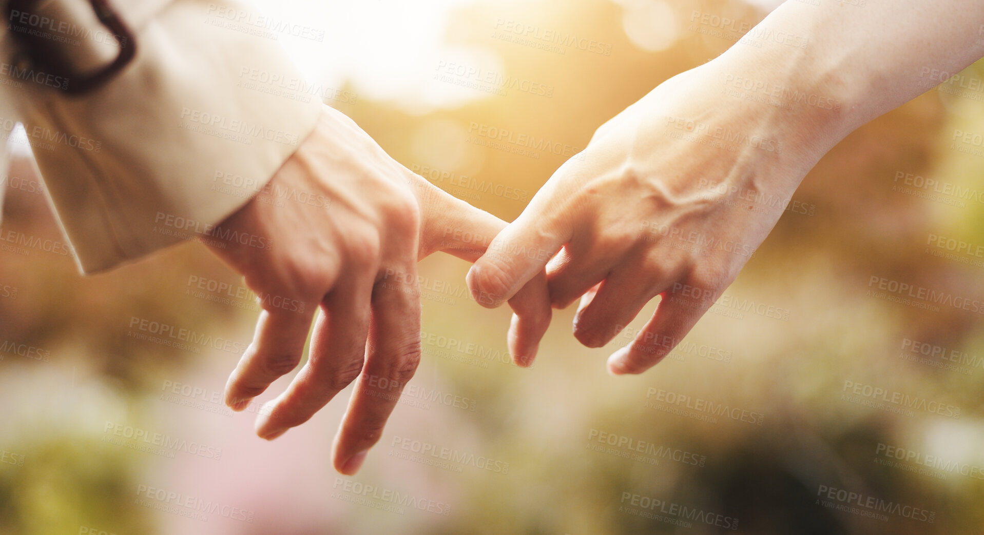 Buy stock photo Love, closeup and holding hands with couple in park for romance, bonding and relationship. Support, care and trust with people in Japan nature date for connection, commitment and peace together