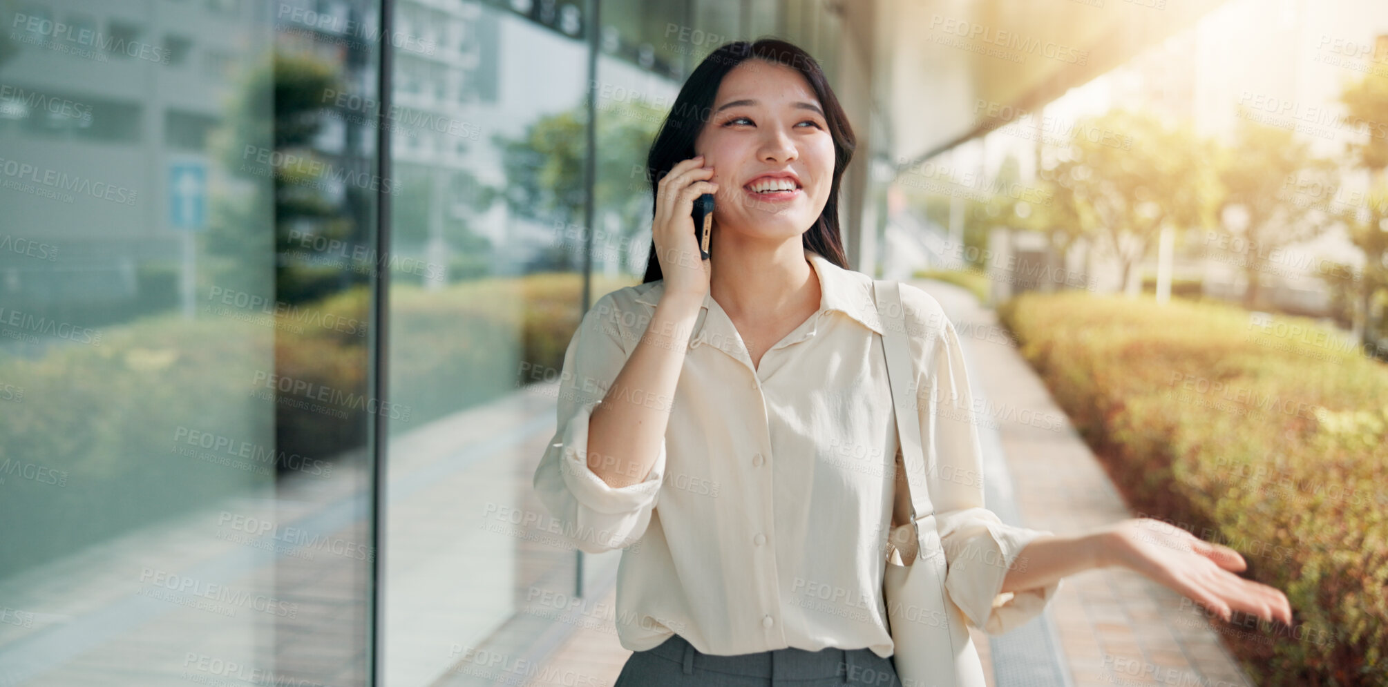 Buy stock photo Building, phone call and walking with business woman outdoor for communication or discussion. Commute, conversation and office with happy Japanese employee in urban town of Tokyo for networking